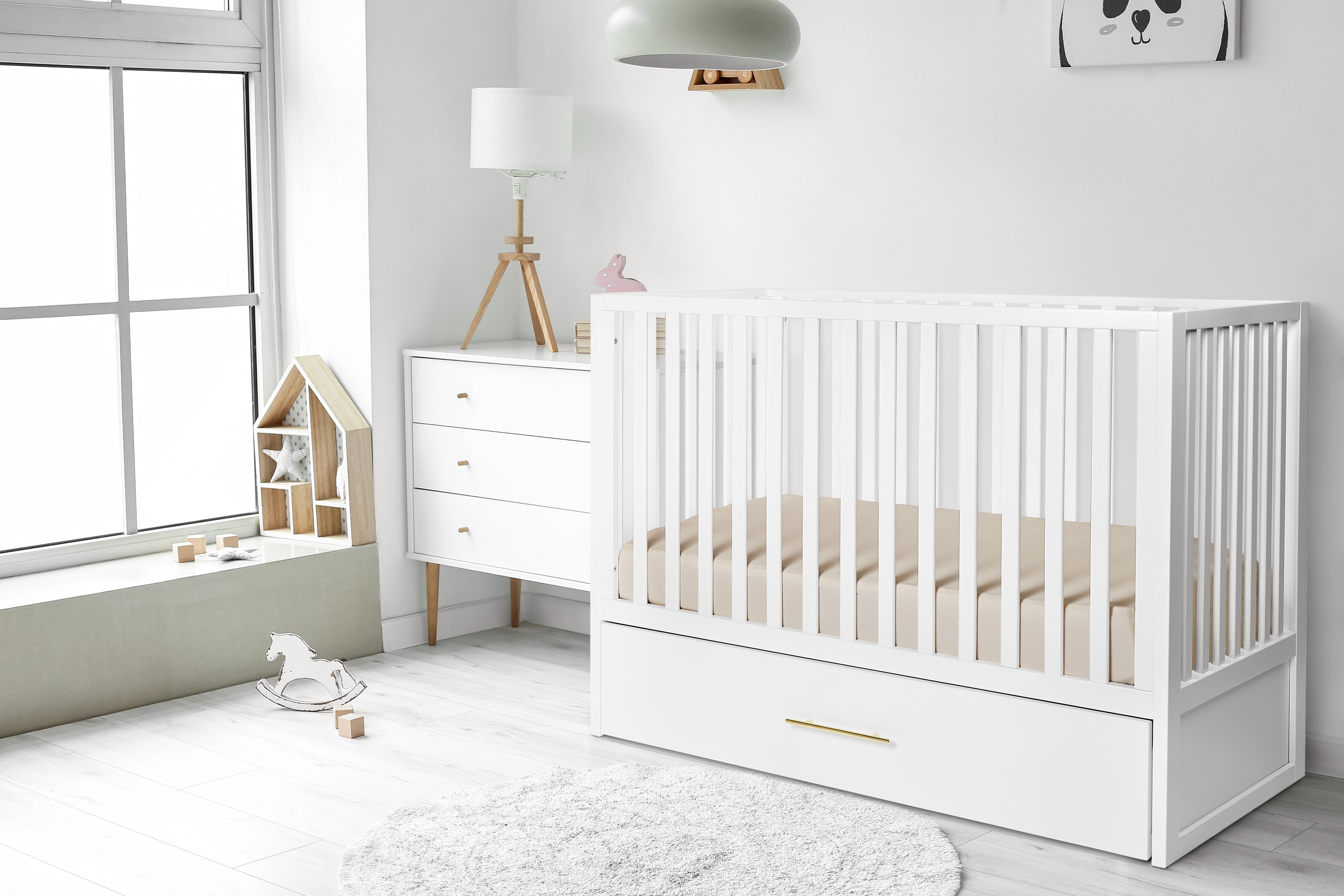 Crib with pull out bed on sale